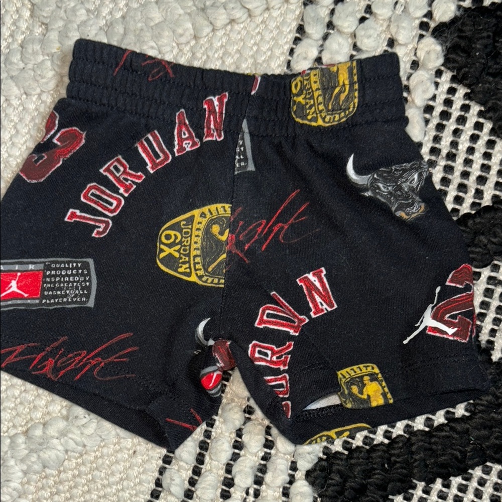 Jordan Black and Red Athletic Shorts with Logo Pattern
